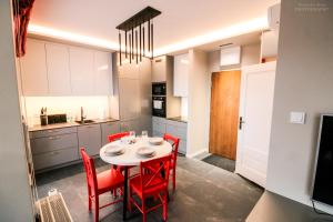 Kuchyňa alebo kuchynka v ubytovaní D Apartments Centrum Ogień