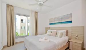 Beach Garden F3 Luxury Condo客房内的一张或多张床位