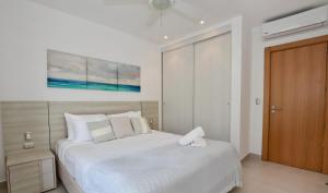 Beach Garden F3 Luxury Condo客房内的一张或多张床位