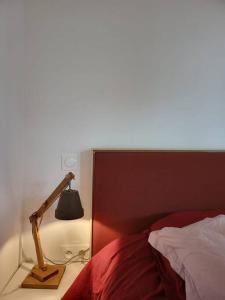 Postel nebo postele na pokoji v ubytování L'annexe de la verrerie