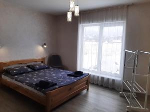 Postel nebo postele na pokoji v ubytování У Мирослави