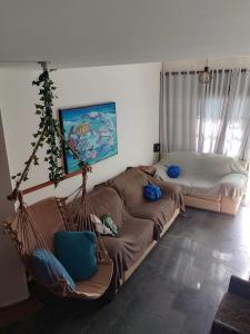 Posezení v ubytování Casa tranquila Massaguaçu