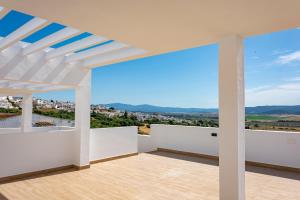 - une vue depuis le balcon d'une maison dans l'établissement Apartamentos El Mirador de la Janda, à Benalup-Casas Viejas