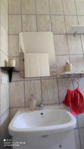 Vonios kambarys apgyvendinimo įstaigoje Casita de Sara