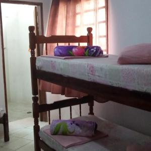 Двухъярусная кровать или двухъярусные кровати в номере Cantinho Jóia
