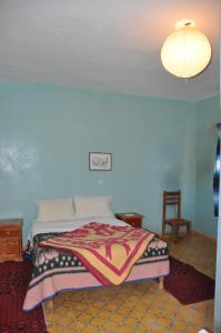 Postel nebo postele na pokoji v ubytování Hotel Riad Oasis