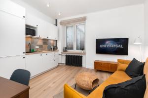 Kuchnia lub aneks kuchenny w obiekcie Apartament Plac Konstytucji by Your Freedom