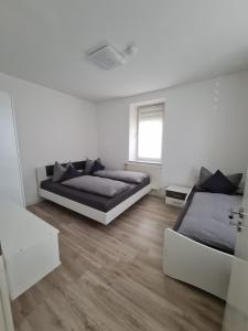 Postel nebo postele na pokoji v ubytování Ganze Wohnung TOP Lage in Kempten (Allgäu)