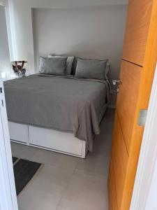 En eller flere senge i et værelse på Patagonia II + 20 billeder