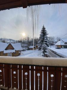 Obiekt Apartamenty pokoje Nad Potokiem zimą