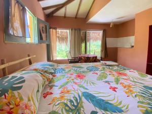 Een bed of bedden in een kamer bij YES PAPA! Rooms at 100m from the beach!
