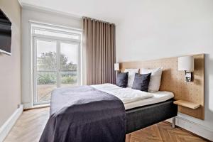 Letto o letti in una camera di Hotel Svendborg