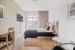 Letto o letti in una camera di Hotel Svendborg