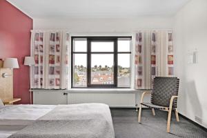 Letto o letti in una camera di Hotel Svendborg
