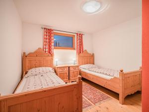 Postel nebo postele na pokoji v ubytování Rantsch Gebirgsbach