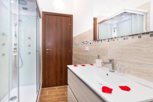 Ένα μπάνιο στο Residenza Alexander Luxury 1