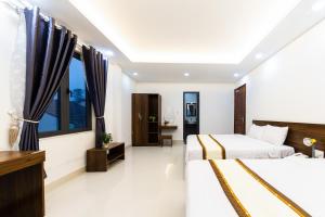 Voodi või voodid majutusasutuse Đà Lạt Cao Nguyên Hotel toas