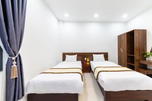 Voodi või voodid majutusasutuse Đà Lạt Cao Nguyên Hotel toas