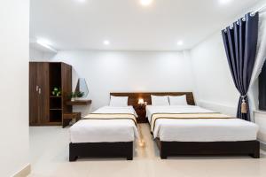 Voodi või voodid majutusasutuse Đà Lạt Cao Nguyên Hotel toas