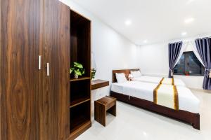 Voodi või voodid majutusasutuse Đà Lạt Cao Nguyên Hotel toas