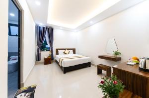 Voodi või voodid majutusasutuse Đà Lạt Cao Nguyên Hotel toas
