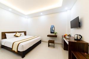 Voodi või voodid majutusasutuse Đà Lạt Cao Nguyên Hotel toas