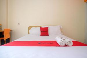 Gambar di galeri bagi RedDoorz @ Jalan Pramuka Manado di Manado +32 gambar