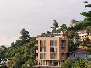 a house on top of a hill at GIORGI kvariati in Kvariati