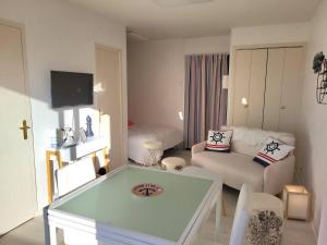 Posedenie v ubytovaní Studio Cabine 4 Pers, Front de Mer, Balcon Sud, Parking Privé, Vélos Inclus, Aucun Animal Autorisé - FR-1-465-84