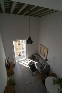 Posezení v ubytování Apartamento Duplex casa Palacio rehabilitado centro El Puerto