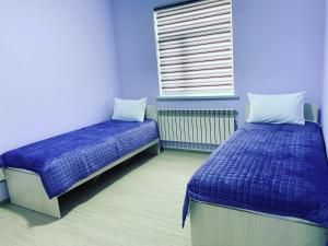 Llit o llits en una habitació de Apart House