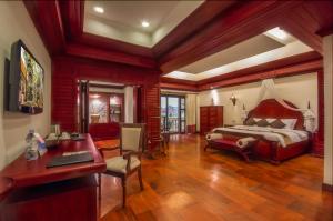 Ένα ή περισσότερα κρεβάτια σε δωμάτιο στο THE PRIVILEGE FLOOR by Borei Angkor