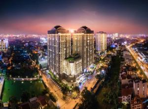 a city skyline at night with tall buildings at D'LEROI SOLEIL- TAY HO- NEAR WESTLAKE IN HA Noi in Hanoi