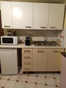Kuchyň nebo kuchyňský kout v ubytování Bed & Breakfast Gabriella EXILLES