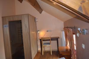 Postel nebo postele na pokoji v ubytování Gîte du Curnolo 3* pour 4/6pers avec spa, piscine