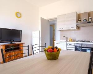 A kitchen or kitchenette at Casa Blasco Porto Cesareo