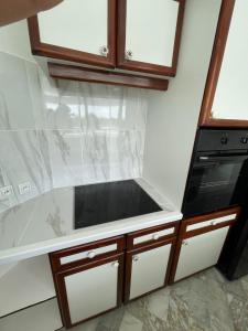Kuchyň nebo kuchyňský kout v ubytování Magnifique studio à 5 min de la Baie Orientale, Idolem résidence unité 5 - 57 Rue du Mont Vernon 1