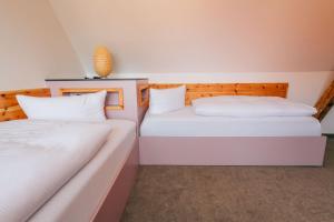 Voodi või voodid majutusasutuse Hotel Andres toas