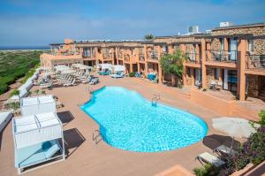 Bazén v ubytovaní Hotel Menorca Binibeca - Adults Recommended - by Pierre & Vacances Premium alebo v jeho blízkosti + 37 fotografií