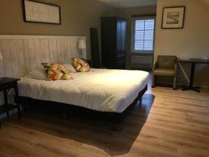 Postel nebo postele na pokoji v ubytování B&B Castellier