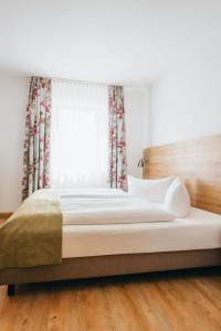 Voodi või voodid majutusasutuse Hotel Andres toas