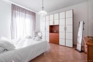 Postel nebo postele na pokoji v ubytování Casa Gioli