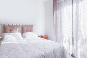 Postel nebo postele na pokoji v ubytování Casa Gioli + 2 fotografie