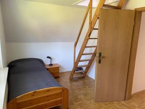Postel nebo postele na pokoji v ubytování Nordseebrise Dangast