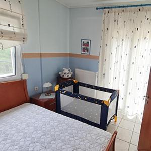 Postel nebo postele na pokoji v ubytování Kyrana Apartments