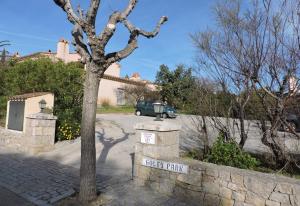 a car is parked in front of a house at Doree 449 in Bonmont Terres Noves