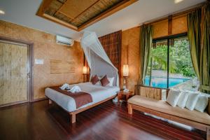 Postel nebo postele na pokoji v ubytování Railay Great View Resort + 37 fotografií