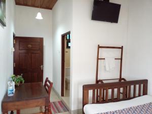 Postel nebo postele na pokoji v ubytování Muduna Walawwa Resort