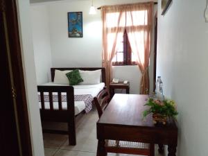 Postel nebo postele na pokoji v ubytování Muduna Walawwa Resort