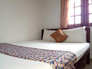Postel nebo postele na pokoji v ubytování Muduna Walawwa Resort